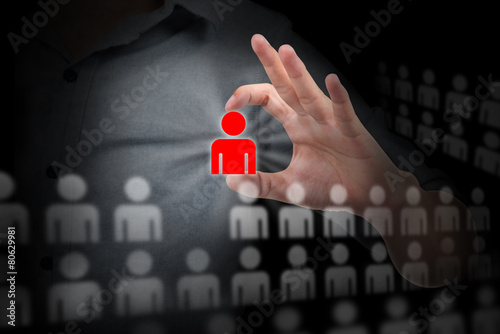 Businessman holding human resources sign - HR, HRM, HRD concept
