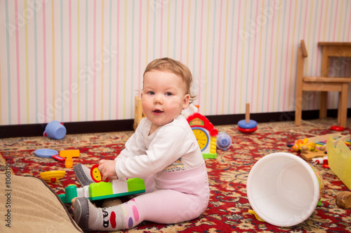 little girl playing in the children's room