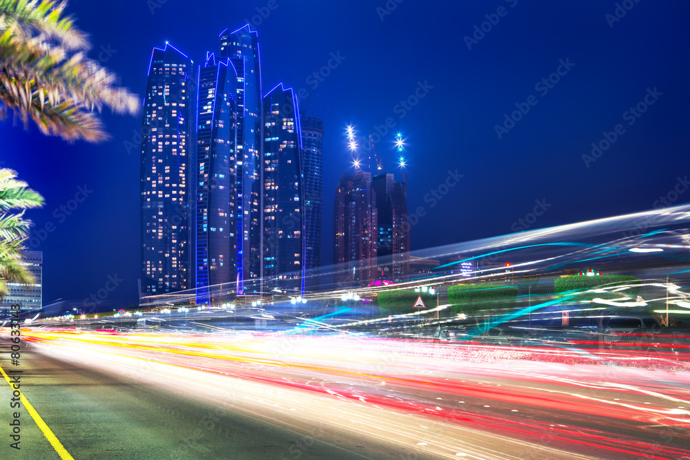 Fototapeta premium Traffic lights on the street of Abu Dhabi at night, UAE