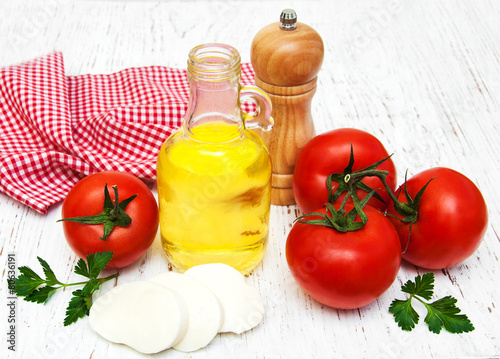 olive oil, mozzarella cheese, garlic and tomatoes