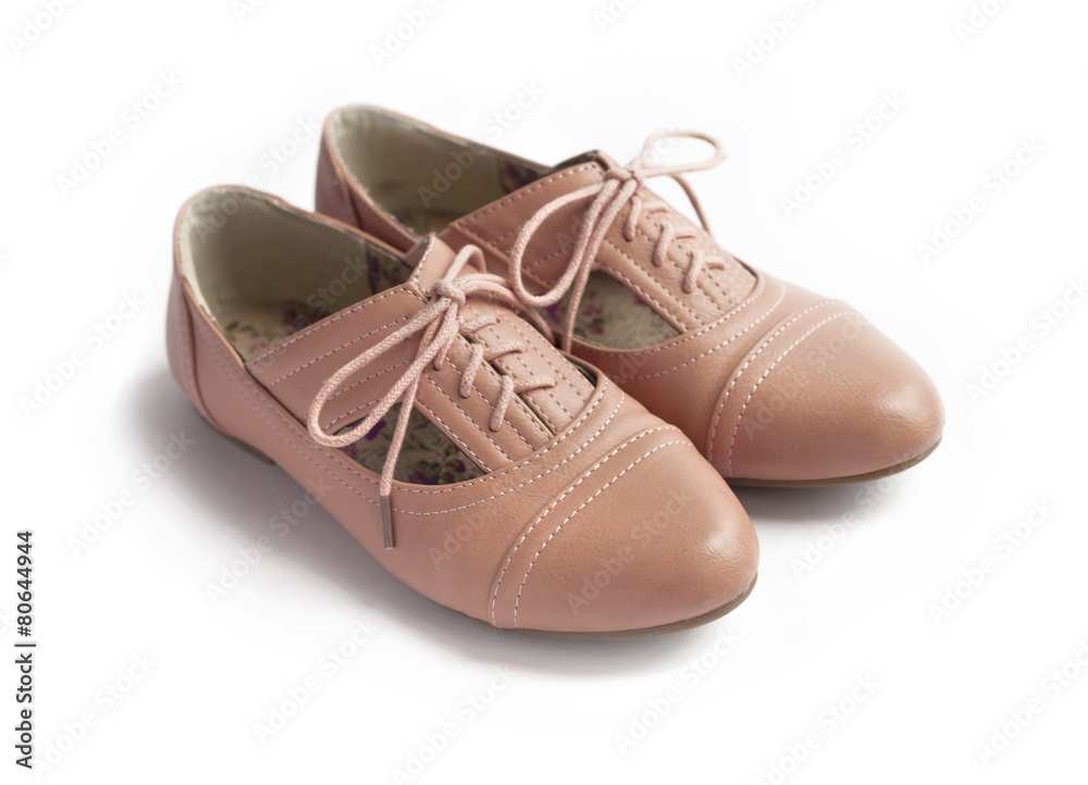 Pair of female shoes on white background