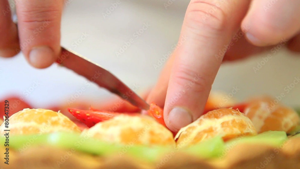 hands pastry chef preparing a fruit tart hands pastry chef preparing a fruit tart