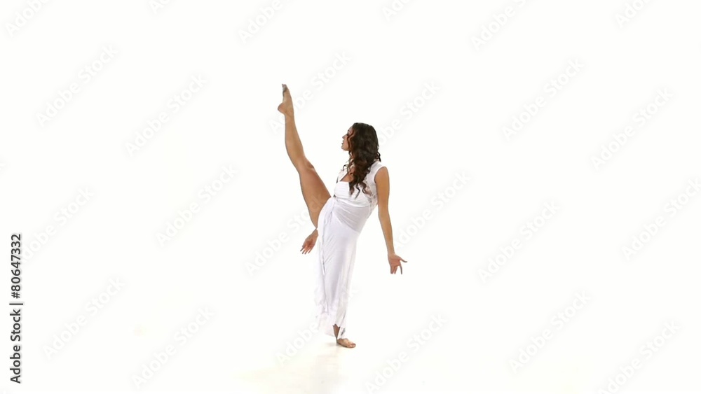 Young and slim woman in light dress dancing contemp jazz modern Young and slim woman in light dress dancing contemp jazz modern