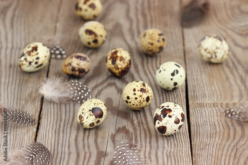 Quail eggs on a wooden table Quail eggs on a wooden table