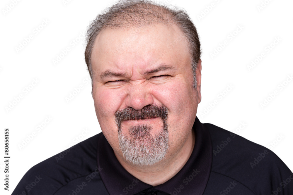 Disgusted man pulling a disdainful expression Disgusted man pulling a disdainful expression