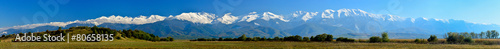 panoramic view of Fagarasi mountains snow capped range photo