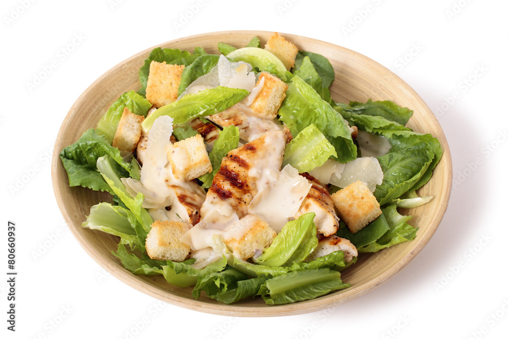 Chicken caesar salad on white background Chicken caesar salad on white background