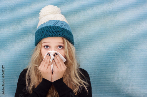 Sick teenager girl with flue