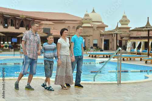 Family near swimming pool