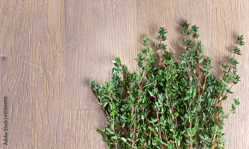 thyme on wooden table