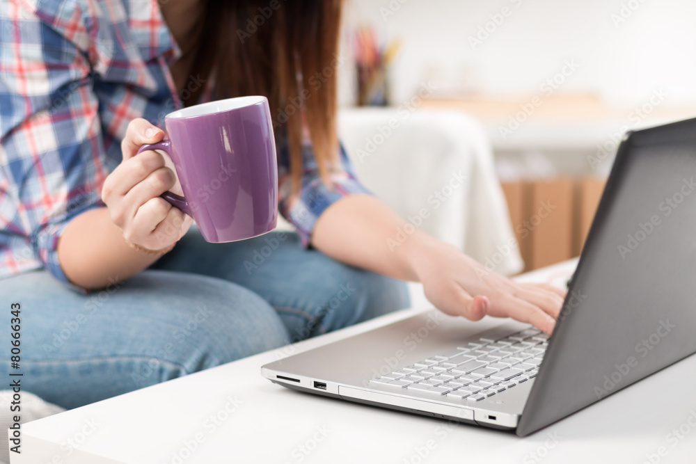 Close up of a woman hands typing in a laptop Close up of a woman hands typing in a laptop