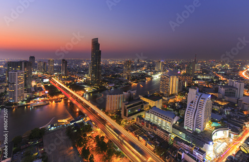 River in Bangkok city with high office building in night time © keangs