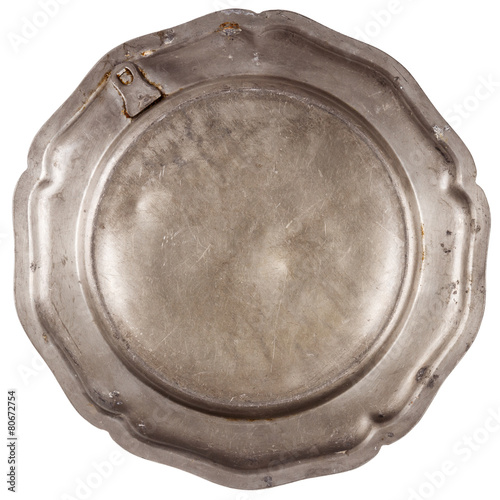 Bottom of old pewter plate photo