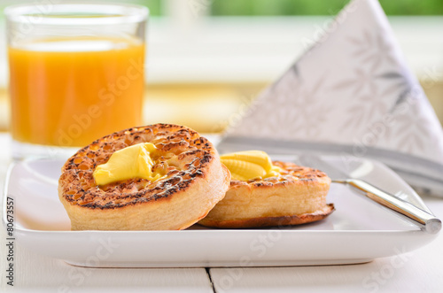 Tableau sur toile Hot fresh crumpets with butter melting on top