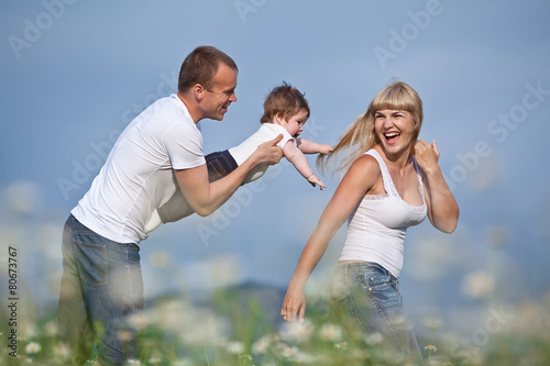 Family in a flowers field