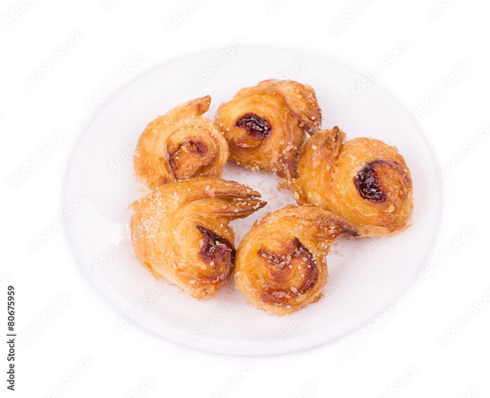 Croissants or crescent rolls on a plate.
