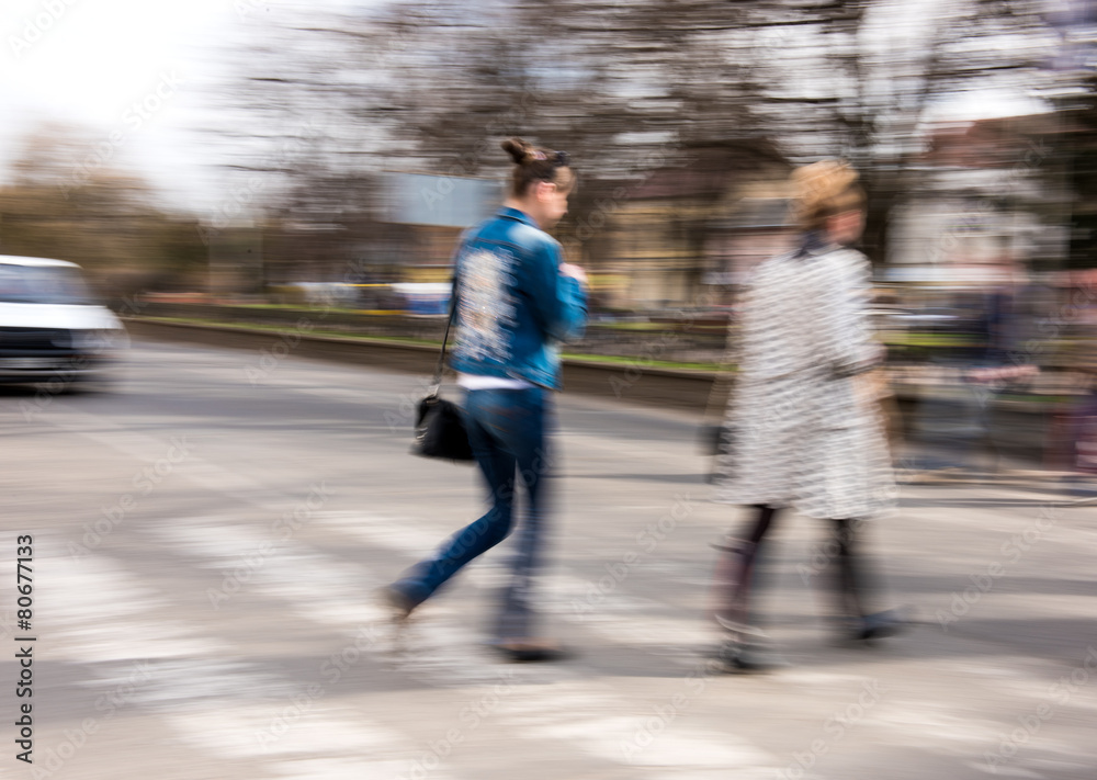 Busy city street people on zebra crossing Busy city street people on zebra crossing