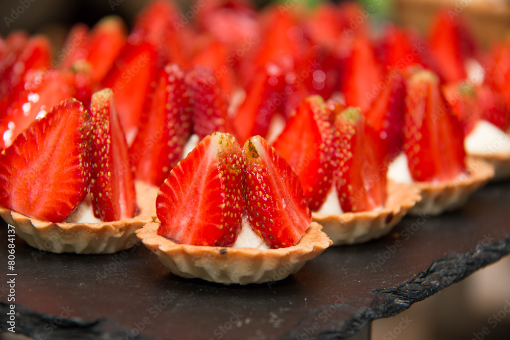 mini tarts with strawberry and vanilla cream.