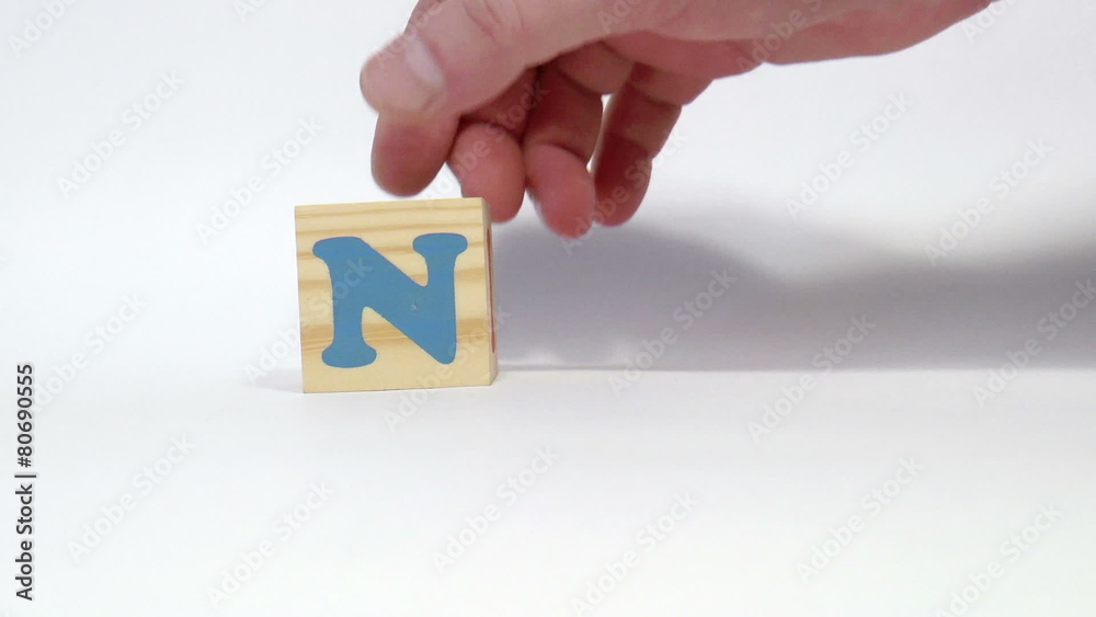 The video shows no word built of wooden blocks The video shows no word built of wooden blocks