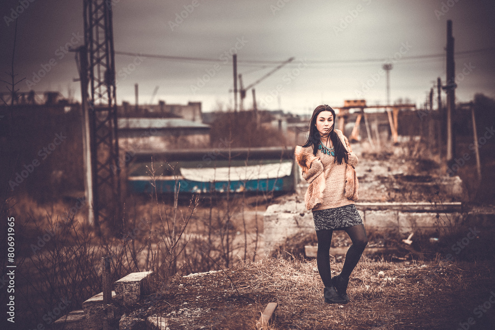 Long hair brunette girl outdoor with old industrial view behind, Long hair brunette girl outdoor with old industrial view behind,
