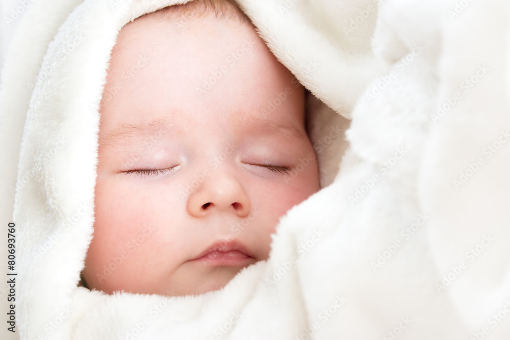 Baby sleeping covered with soft blanket Baby sleeping covered with soft blanket