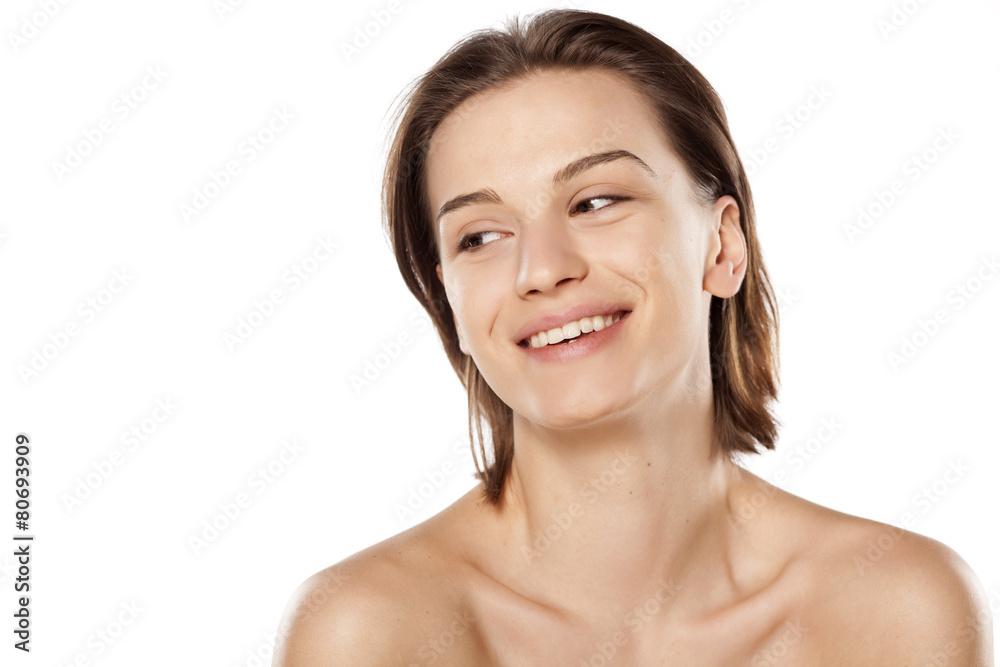 Happy young beautiful girl without make up on white background Happy young beautiful girl without make up on white background
