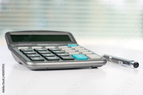 Calculator on a white table