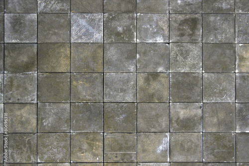 Aligned photo of stylish paving slabs / textured floor tile