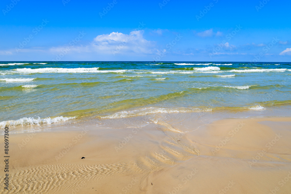 Waves on Baltic Sea beach near Leba, Poland