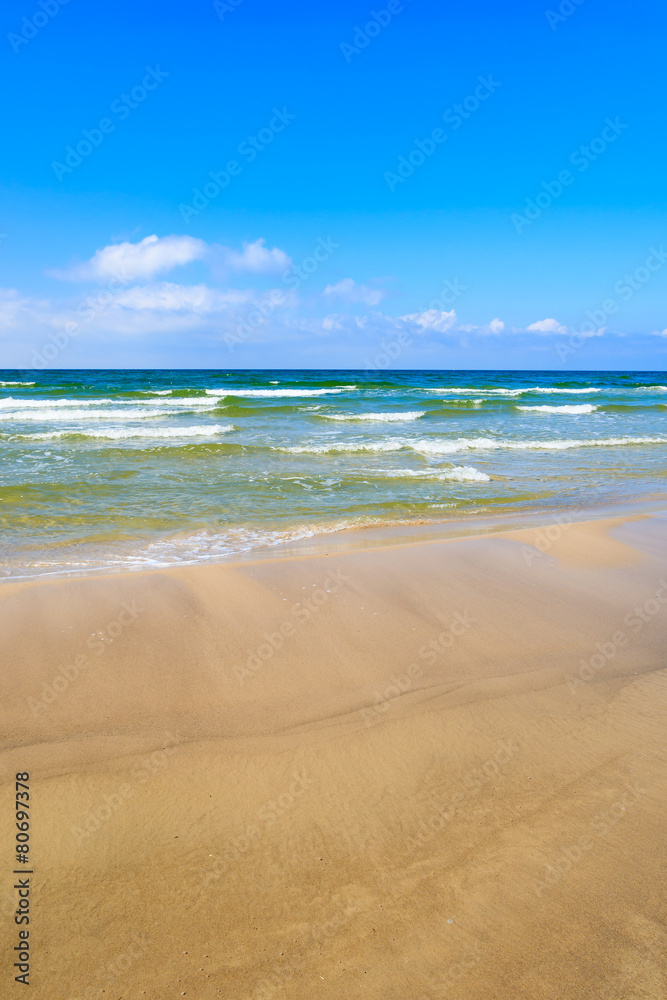 Waves on Baltic Sea beach near Leba, Poland