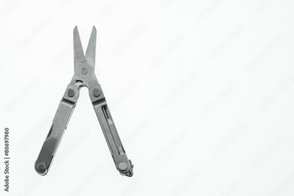 Pocket knife or Steel multi-function tools isolated on white Pocket knife or Steel multi-function tools isolated on white