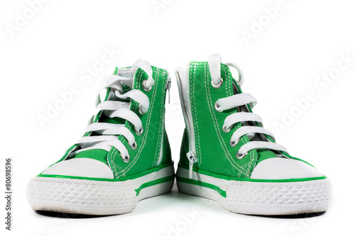 Pair of fashionable sneakers isolated