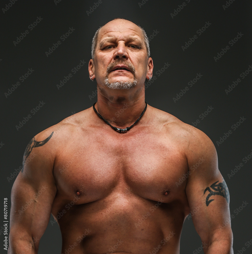Fototapeta premium Strong muscular middle age man