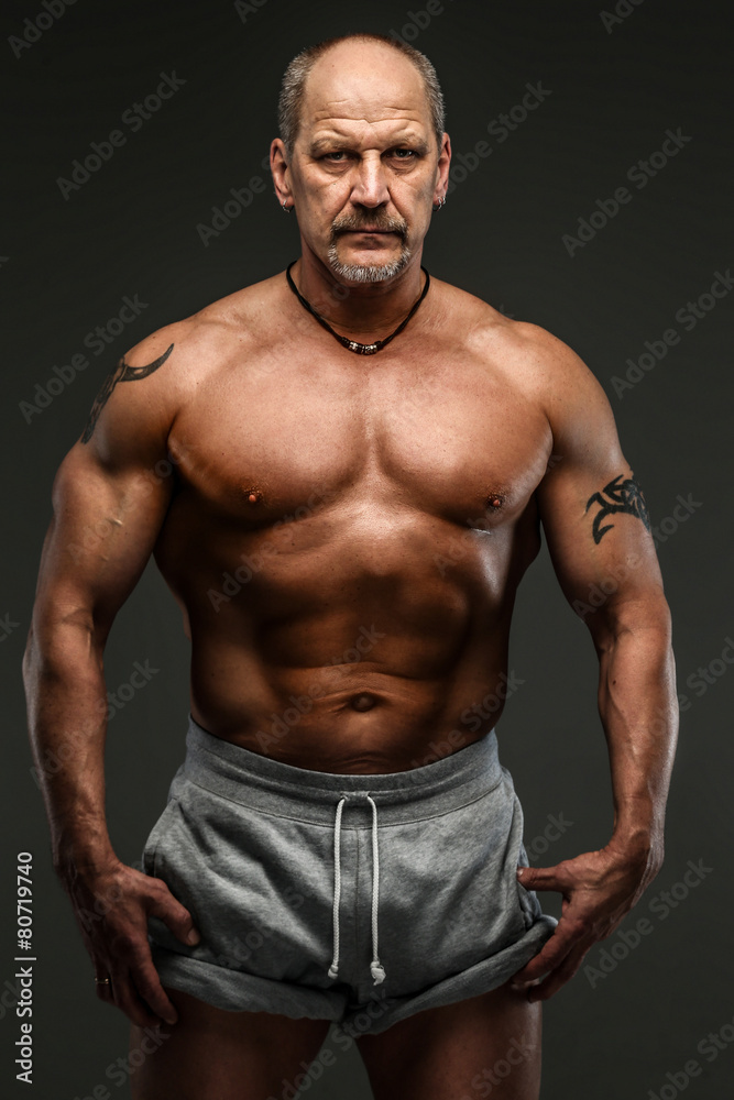 Strong muscular middle age man