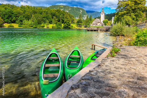 Wonderful alpine lake and colorful boats,Lake Bohinj,Slovenia photo