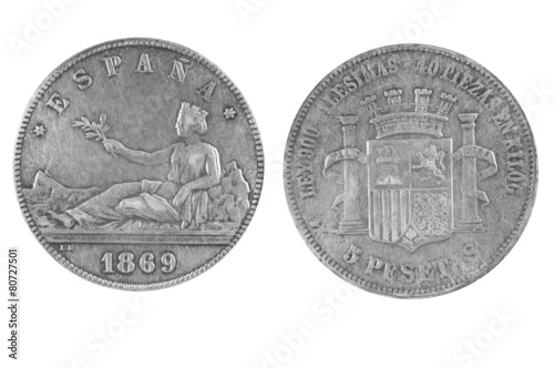 Old Spanish Coin on a white background 1869 year