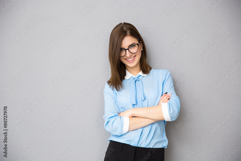 Portrait of a happy businesswoman with arms folded Portrait of a happy businesswoman with arms folded