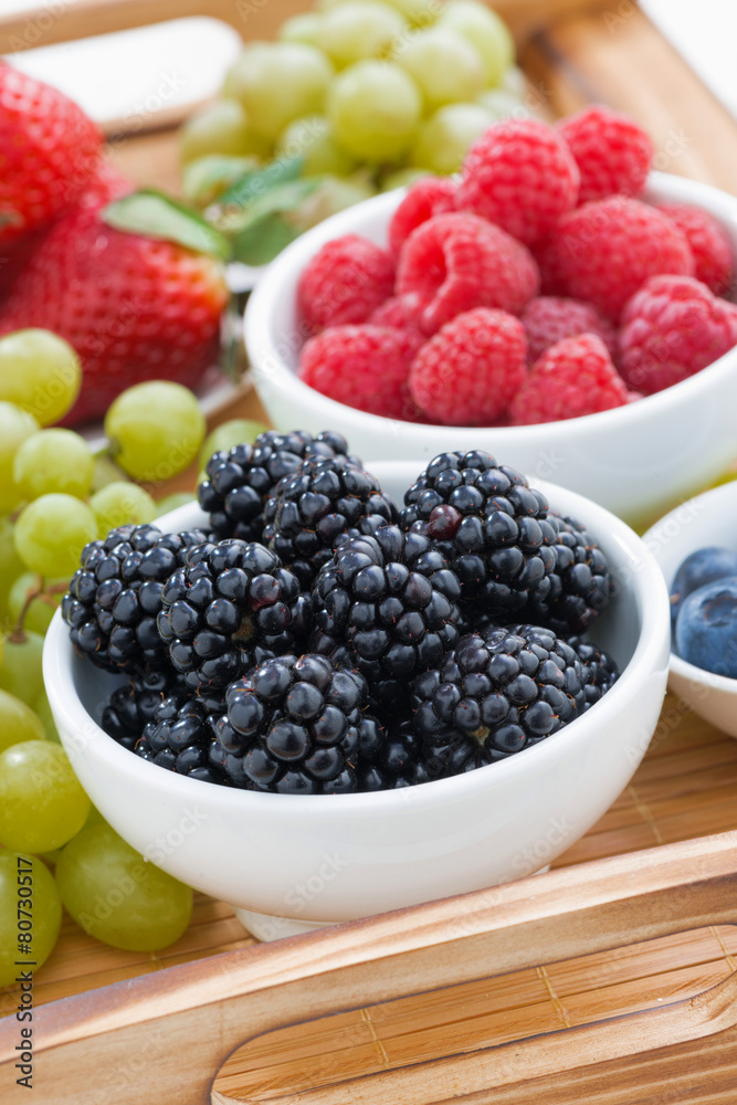 bowl of blackberries, fresh berries and green grapes bowl of blackberries, fresh berries and green grapes