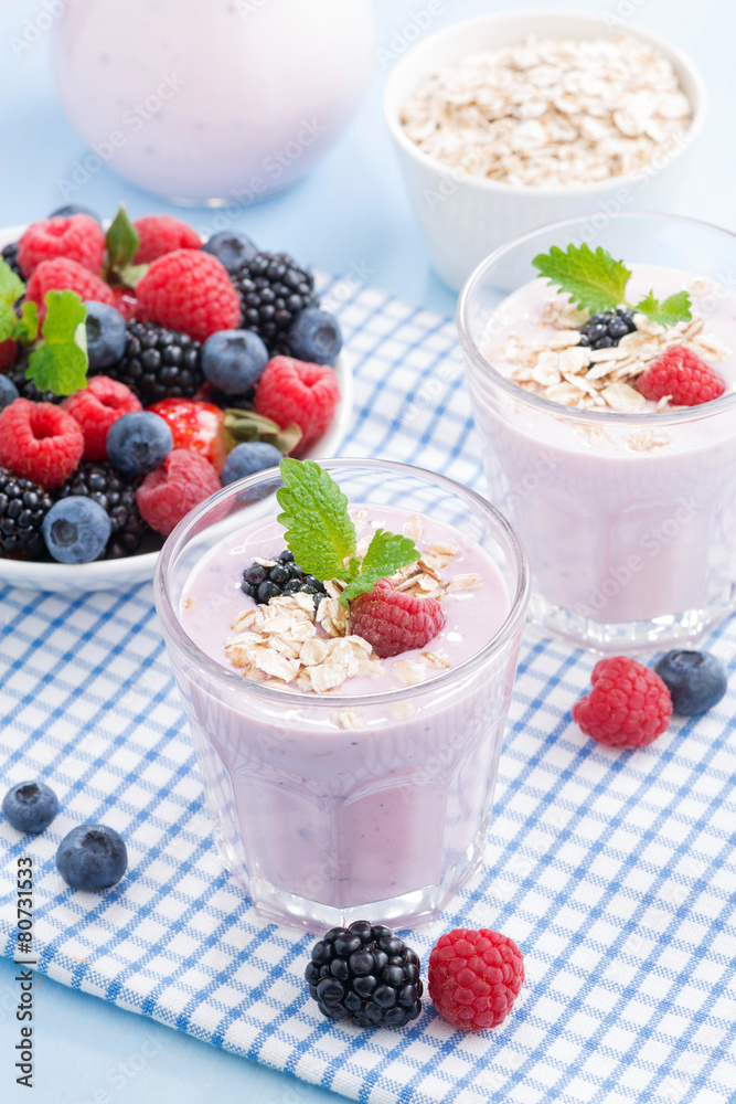 healthy berry smoothies with oatmeal, vertical, close-up healthy berry smoothies with oatmeal, vertical, close-up
