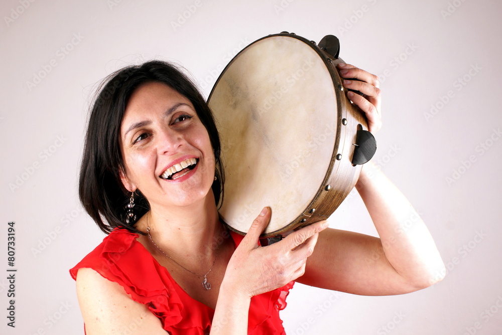 Fototapeta premium Woman with tambourine