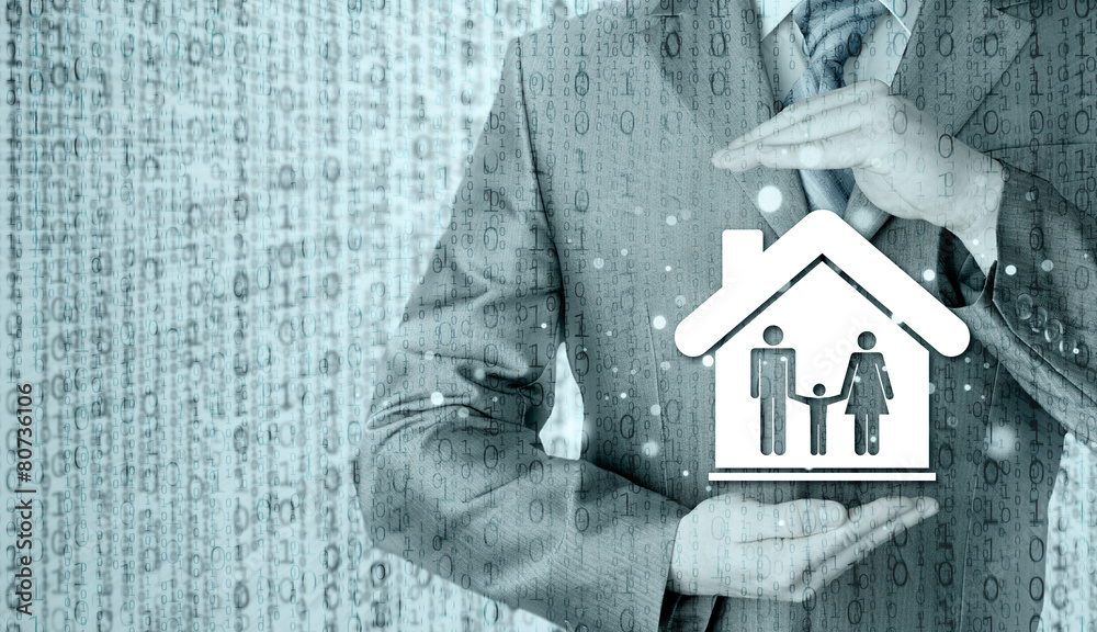 businessman protecting family in home with hands businessman protecting family in home with hands