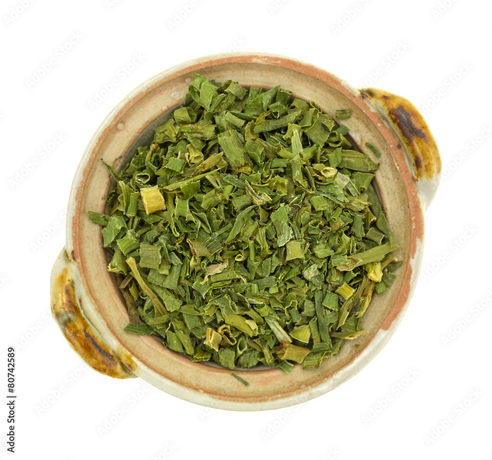 Chopped chives in a small bowl Chopped chives in a small bowl