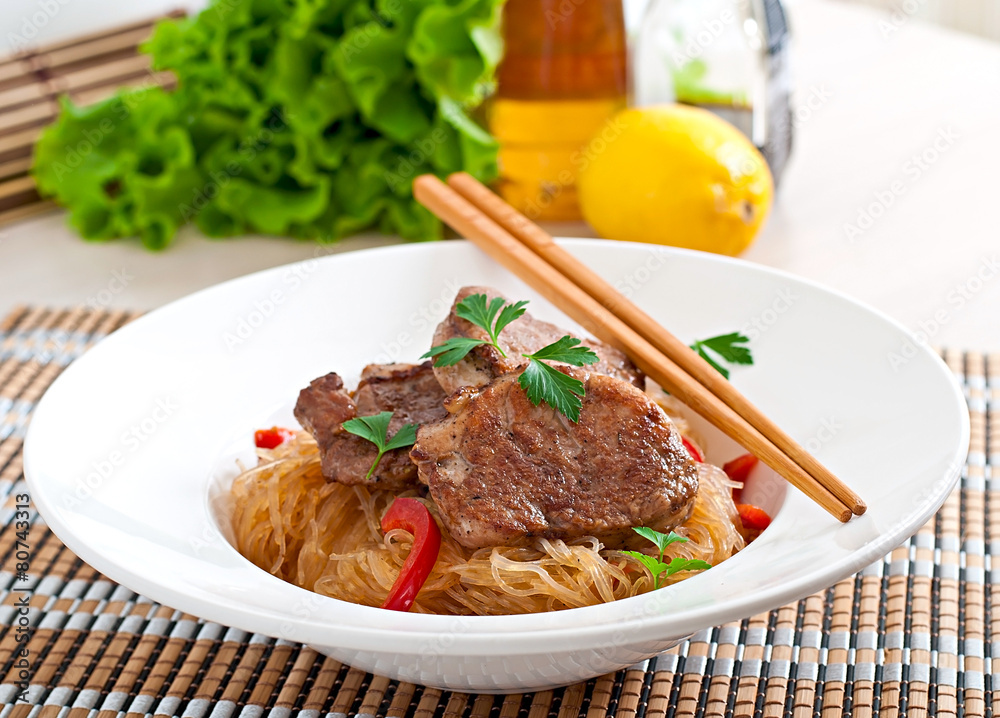 Pork medallions in oyster sauce with noodles Pork medallions in oyster sauce with noodles