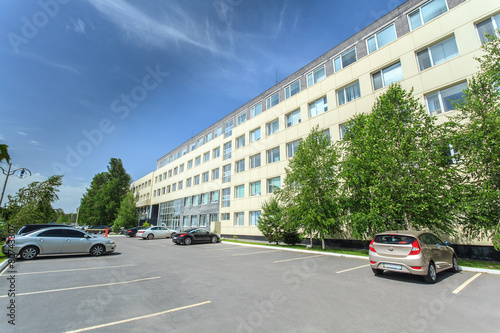 office building facade, parking