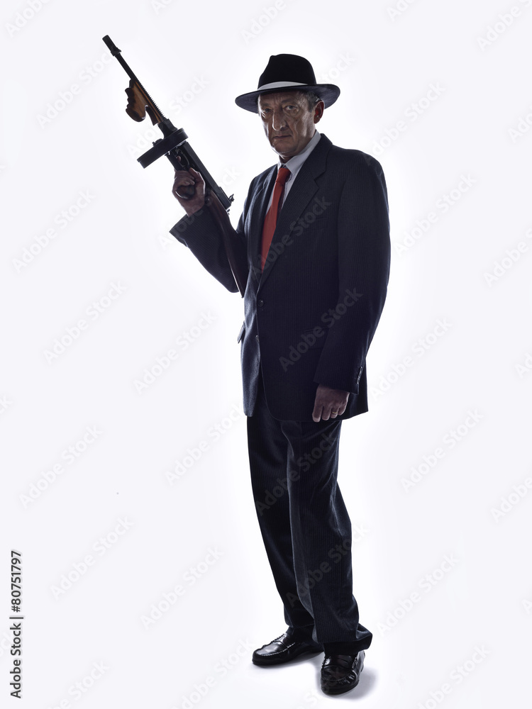 Old style gangster with tommy gun, on white background Stock Photo | Adobe  Stock