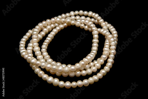 Vintage pearl necklace isolated on black