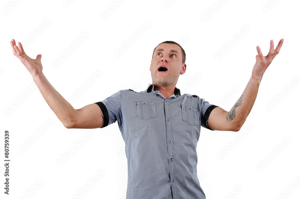 Fototapeta premium Portrait of young man with hands lifted upwards