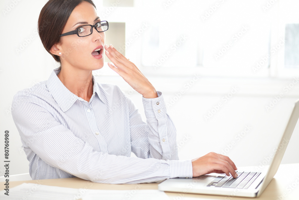 Business employee working on her computer Business employee working on her computer