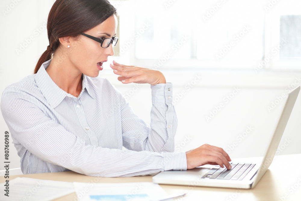 Lady secretary with glasses working on desk Lady secretary with glasses working on desk