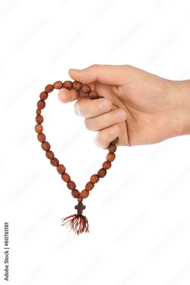 Hand with rosary Hand with rosary